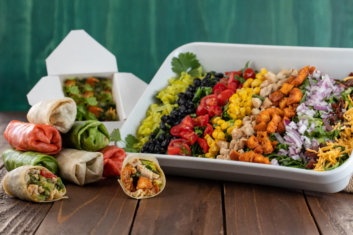 a box filled with different types of food on a table